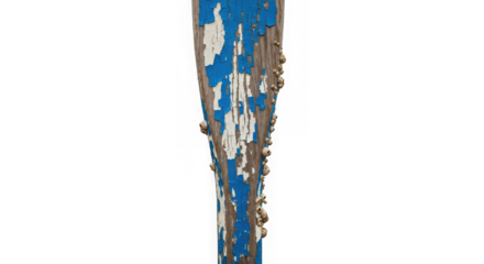 Weathered wooden marine pole with peeling blue paint and barnacles.