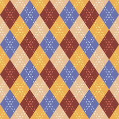 Seamless argyle pattern on dark brown and brown, blue, yellow, beige cream, repeat seamless pattern