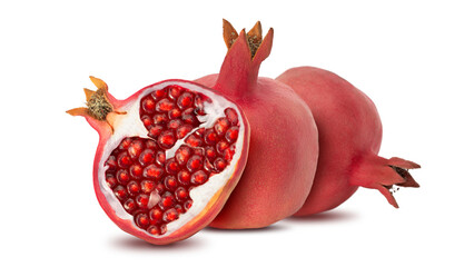 Fresh pomegranate cut in half with bright red seeds on a white background capturing detailed texture and color of the fruit