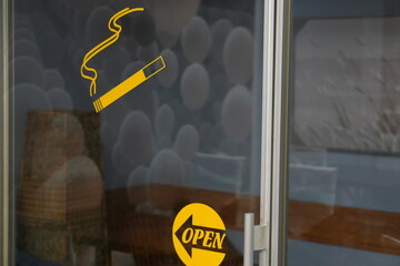 Smoking Area Sign on Glass Door