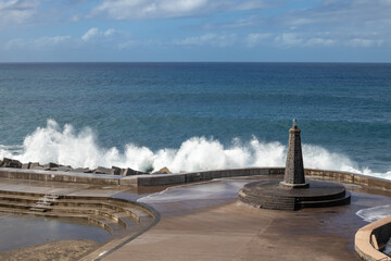 Lighthouse and waves, Bajamar, Tenerife, Spain