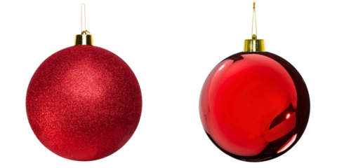 Pair of red Christmas ornaments with glitter and glossy finishes hanging as classic holiday decorations
