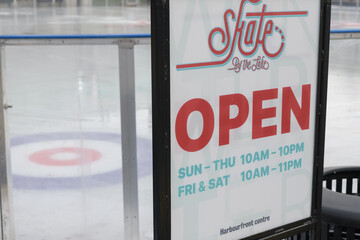 Fototapeta premium Skate by the Lake sign at Harbourfront Centre located at 235 Queens Quay W, Toronto