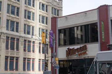 Obraz premium exterior building and sign of The Ballroom Bowl (John St) and exterior building facade of 299 Queen St W, Toronto