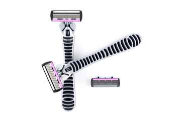 composition of two razors and a replacement cartridge