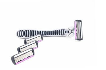 razor and a row of three spare blades