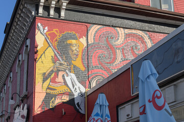 Fototapeta premium mural on the west facing wall of The Duke, a bar, located at 1225 Queen St E, Toronto