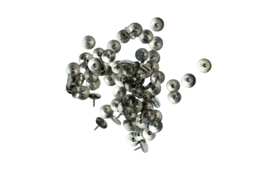 Scattered metal thumb tacks on transparent background
