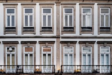 Fototapeta premium Façade of old buildings, with their typical windows and balconies, in the historic part of the city of Porto, Portugal, 2023