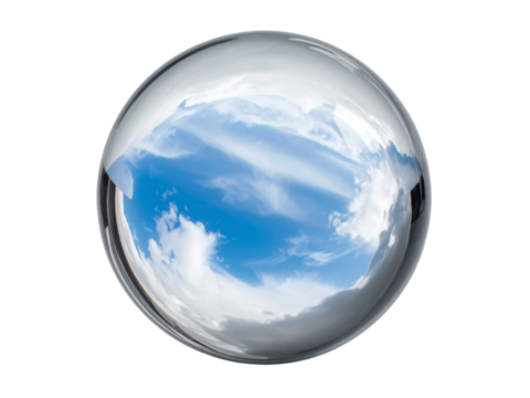 Glass orb reflecting panoramic view of blue sky with white clouds