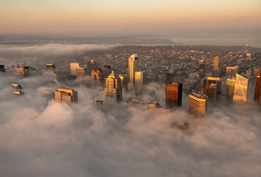 An aerial view of Puget Sound, West Seattle and downtown Seattle from a helicopter in autumn