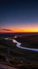Fototapeta premium Tranquil landscape view during the moment of twilight, where the fading light casts long shadows and deep colors across the surrounding terrain, quiet, dusk, vast