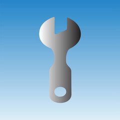 Silver wrench tool on blue gradient background for repair and maintenance