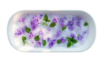 An oval white container (mini-bath) filled with milky-white liquid and soft foam. Bright purple lilac blossoms float on the surface against a transparent background.