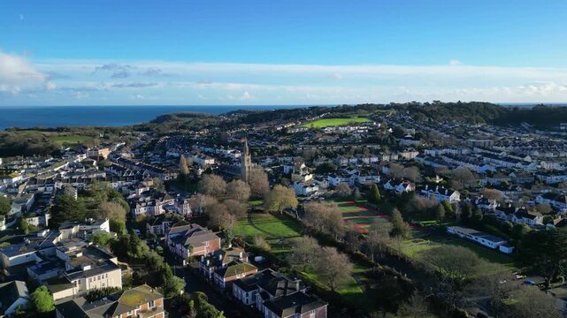 St Marychurch, Babbacombe, South Devon, England: DRONE VIEWS: The sea, All Saints Church, Cary Park, the residential housing of Babbacombe and St Marychurch. South Devon is a popular UK holiday area.