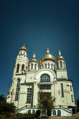 Fototapeta premium White Orthodox cathedral golden domes