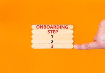 Time to step 3 onboarding symbol. Concept words Onboarding step 3 on beautiful wooden block. Businessman's hand. Beautiful orange background. Business success step 3 onboarding concept. Copy space.