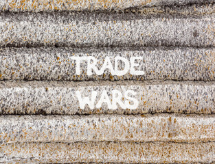 Trade wars symbol. Concept word Trade wars on beautiful grey mountain wall. Beautiful grey mountain wall background. Business trade wars concept. Copy space.