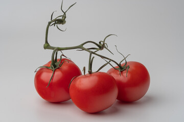 tomatoes on a wooden background