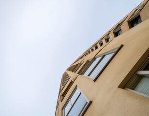 Fototapeta premium Modern Architectural Structure with Geometric Design and Blue Sky