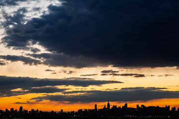 Naklejka premium New York City skyline during sunset viewed from Queens