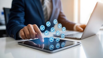 A person interacting with digital tablet in office. Checkmarks floating above the tablet