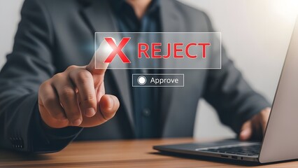 Business professional rejecting a proposal with a digital interface and laptop computer