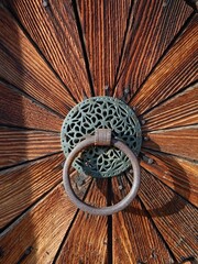Old wooden door and knocker..