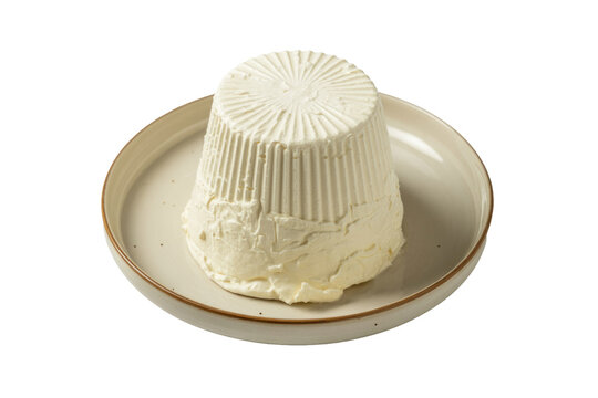 Fresh, creamy ricotta cheese, shaped conically, served on a rustic ceramic plate. A delicious dairy product for various culinary uses. background removed