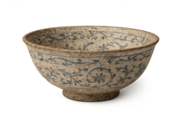 Ancient ceramic bowl with blue floral patterns isolated on transparent background