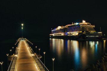 Luxury Cruise Ship and Modern Pier at Tallinn Terminal Night