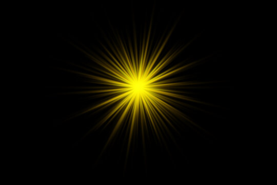 Yellow starburst lens flare light effect on abstract background
