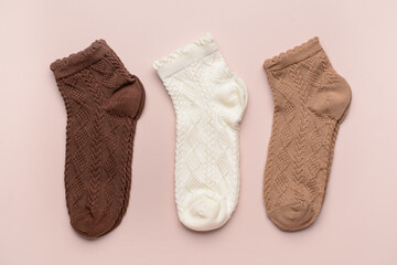 Basic color socks on beige background