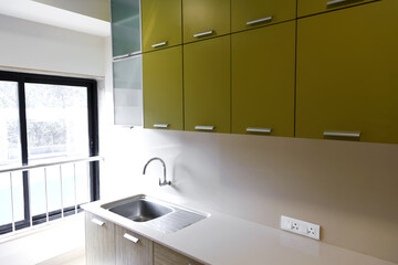 An elegant and simple new construction of an apartment kitchen.
