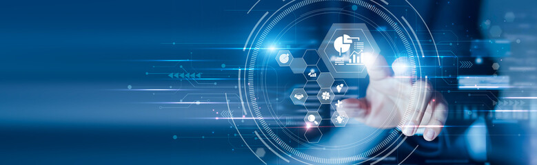 Businessman touching the business analytics dashboard and performance insights. Trend forecasting, KPI tracking, data modeling and strategic decision-making.