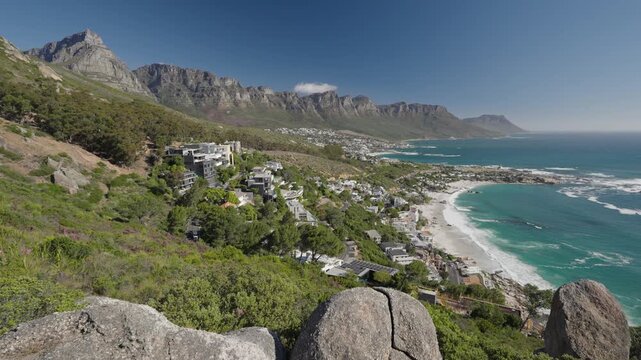 View of the Atlantic Seaboard from The Rock view site at Bantry Bay showing Clifton Beach, Camps Bay and the 12 Apostles. Cape Town. Western Cape. South Africa. 30fps footage captured in 4k 60p.