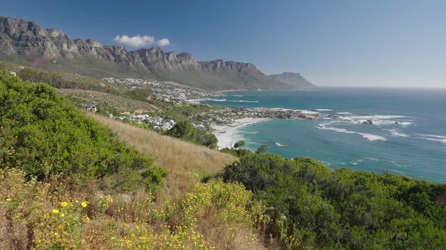 View of the Atlantic Seaboard from The Rock view site at Bantry Bay showing Clifton Beach, Camps Bay and the 12 Apostles. Cape Town. Western Cape. South Africa. 30fps footage captured in 4k 60p.