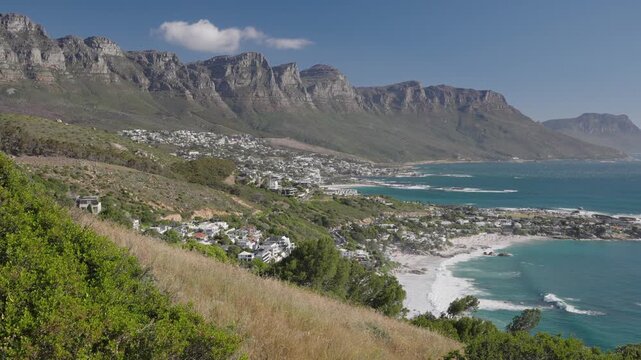 View of the Atlantic Seaboard from The Rock view site at Bantry Bay showing Clifton Beach, Camps Bay and the 12 Apostles. Cape Town. Western Cape. South Africa. 30fps footage captured in 4k 60p.