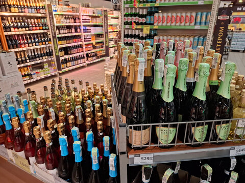 Different alcoholic products on a supermarket shelves