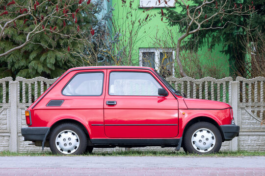 Nowy Tomysl, Poland - November 28, 2025. Side view of the iconic, classic Fiat 126p (also known as "Maluch"), produced in Poland from 1973 to 2000.