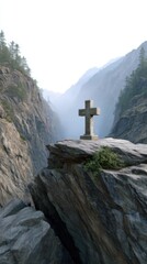 A small cross carved into a rocky cliff, surrounded by misty mountains at dawn. 