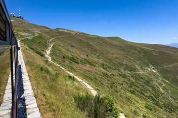 Train climbing up to Monte Generoso, located on the border between Switzerland and Italy and between Lake Lugano and Lake Como.