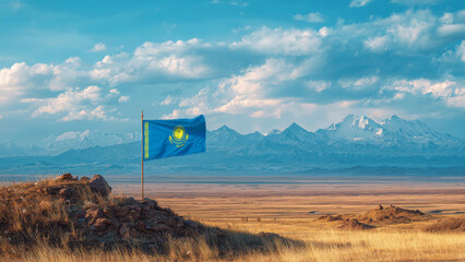 Kazakh flag waves proudly over vast steppe landscape during Independence Day celebrations