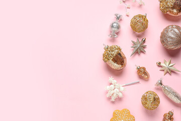 Composition with different Christmas balls on pink background