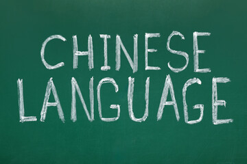 Obraz premium Text CHINESE LANGUAGE on green chalkboard