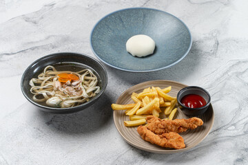 Tasty fusion meal laid out beautifully on a marble surface