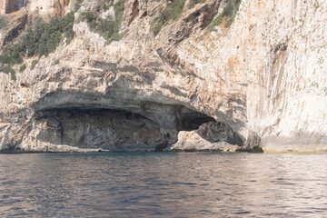 Sea Cave in Rocky Cliff