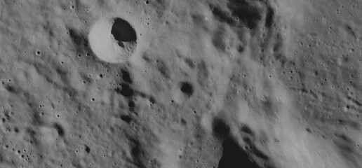 Detailed Lunar Surface Texture with Craters and Shadows from Space © Aerial View