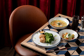 A vibrant meal showcases fresh ingredients and rich flavors, served on stylish dishes