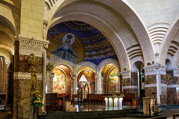 Naklejka premium Interior of the Basilica in the Sanctuary of Lourdes, France. Mayor pilgrimage spot for Catholics